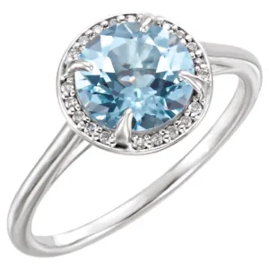 14k Gold 8mm Round Sky Blue Topaz and .05CTW Diamond Halo Ring