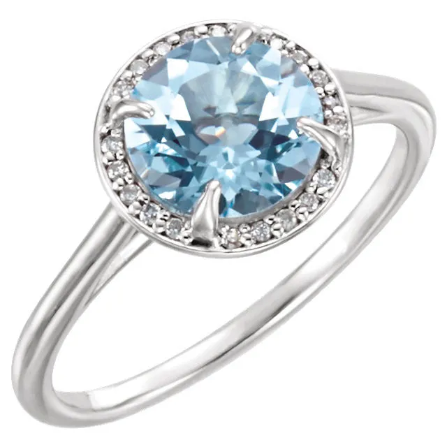 14k Gold 8mm Round Sky Blue Topaz and .05CTW Diamond Halo Ring