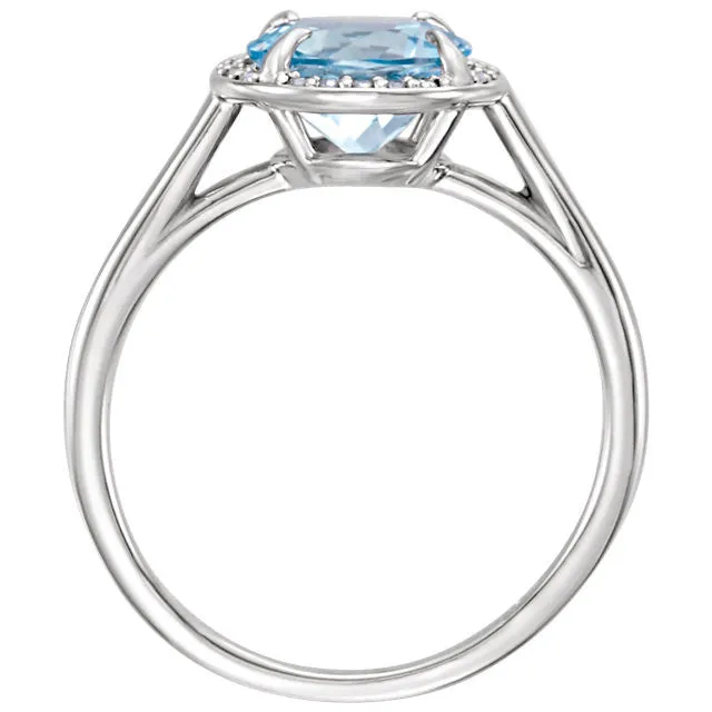 14k Gold 8mm Round Sky Blue Topaz and .05CTW Diamond Halo Ring