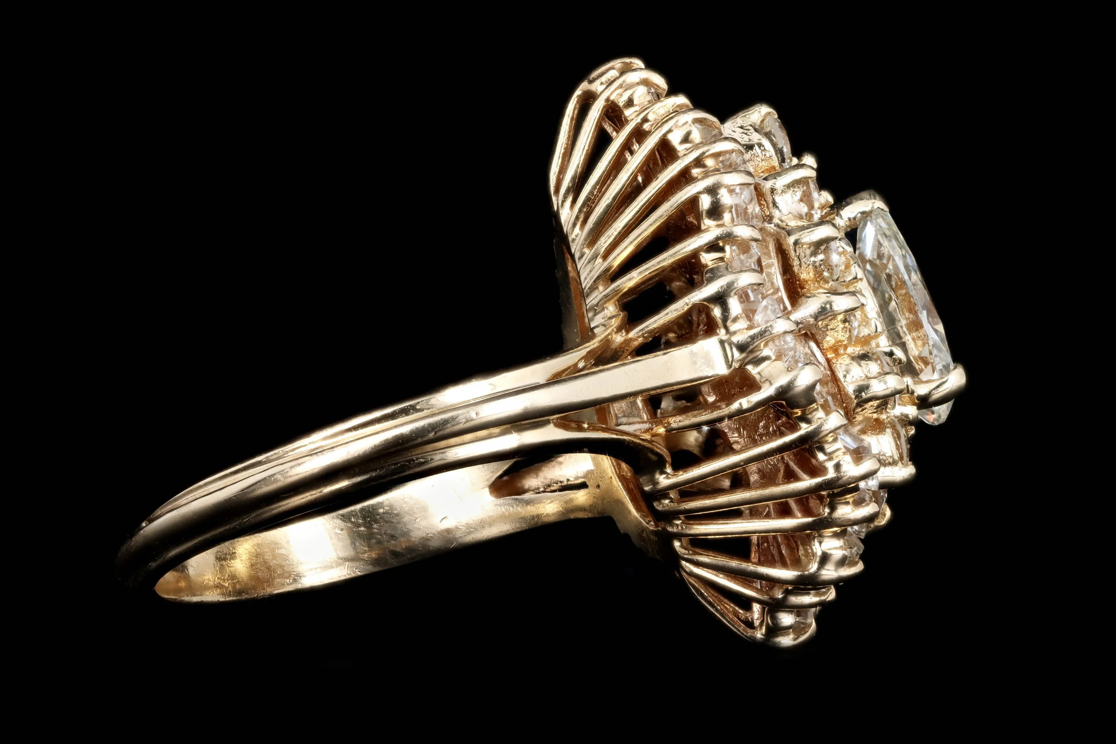 14K Yellow Gold 0.75 Carat Pear Cut Diamond Ballerina Halo Ring