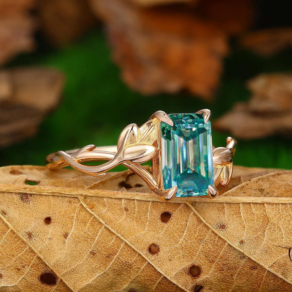 2.5 CT Emerald Cut Blue Moissanite 14K Gold Leaf Twist  Solitaire Ring