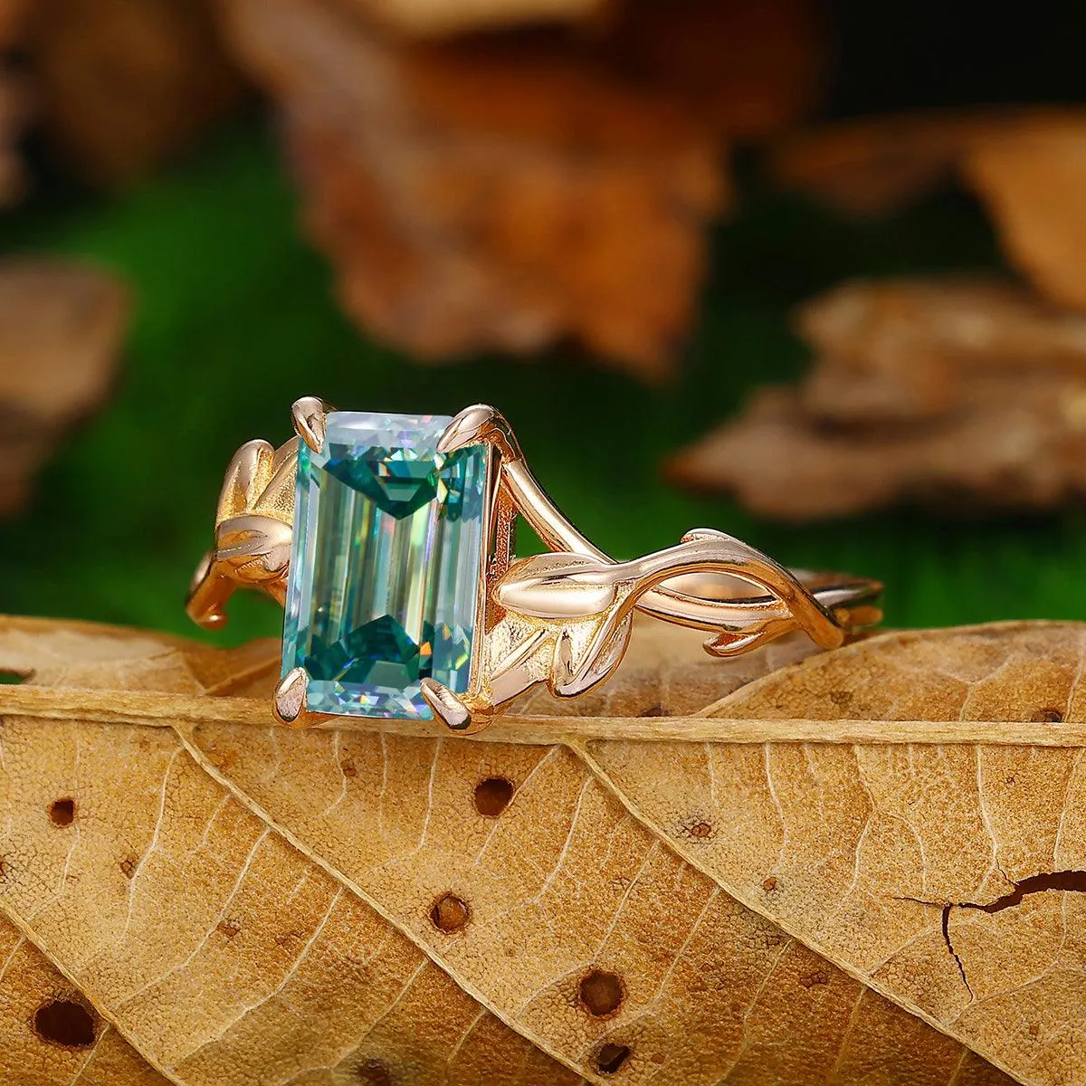 2.5 CT Emerald Cut Blue Moissanite 14K Gold Leaf Twist  Solitaire Ring