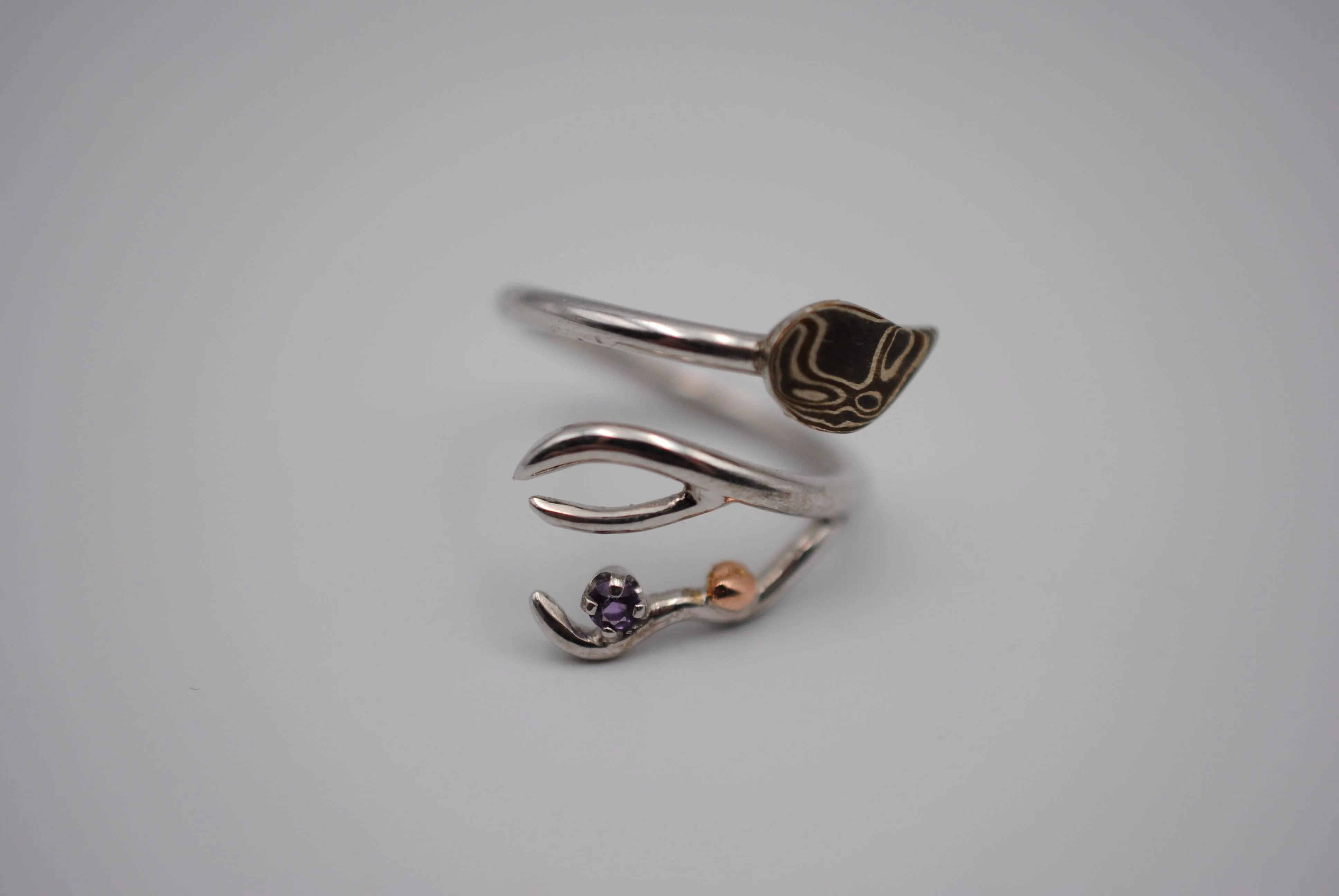 Branching Mokume Leaf Rhodium Roots Ring with Amethyst Gemstone and Gold Accent