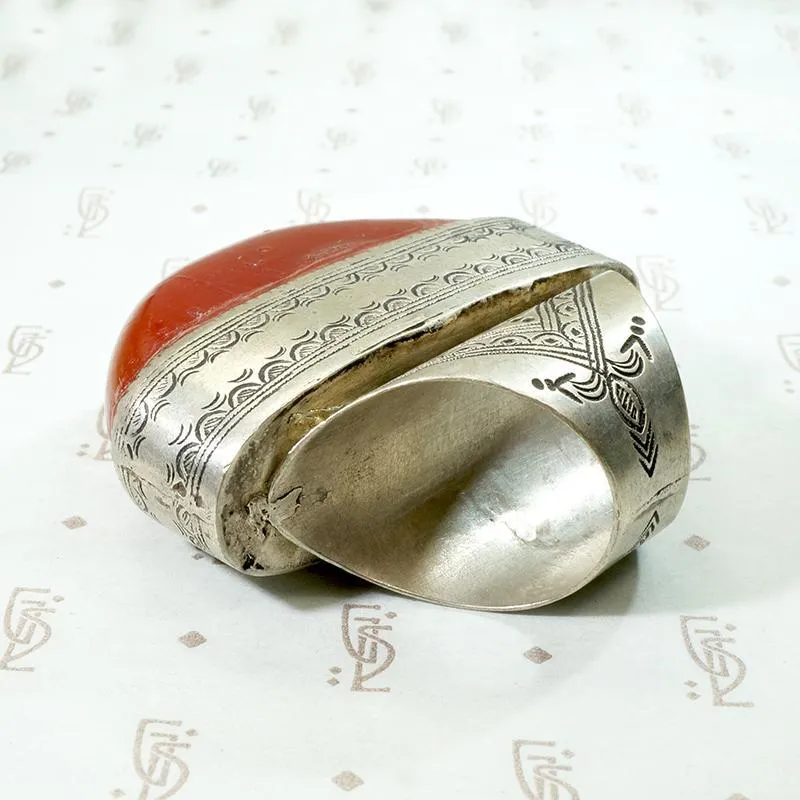 Massive Red Copal in Engraved Metal Ring