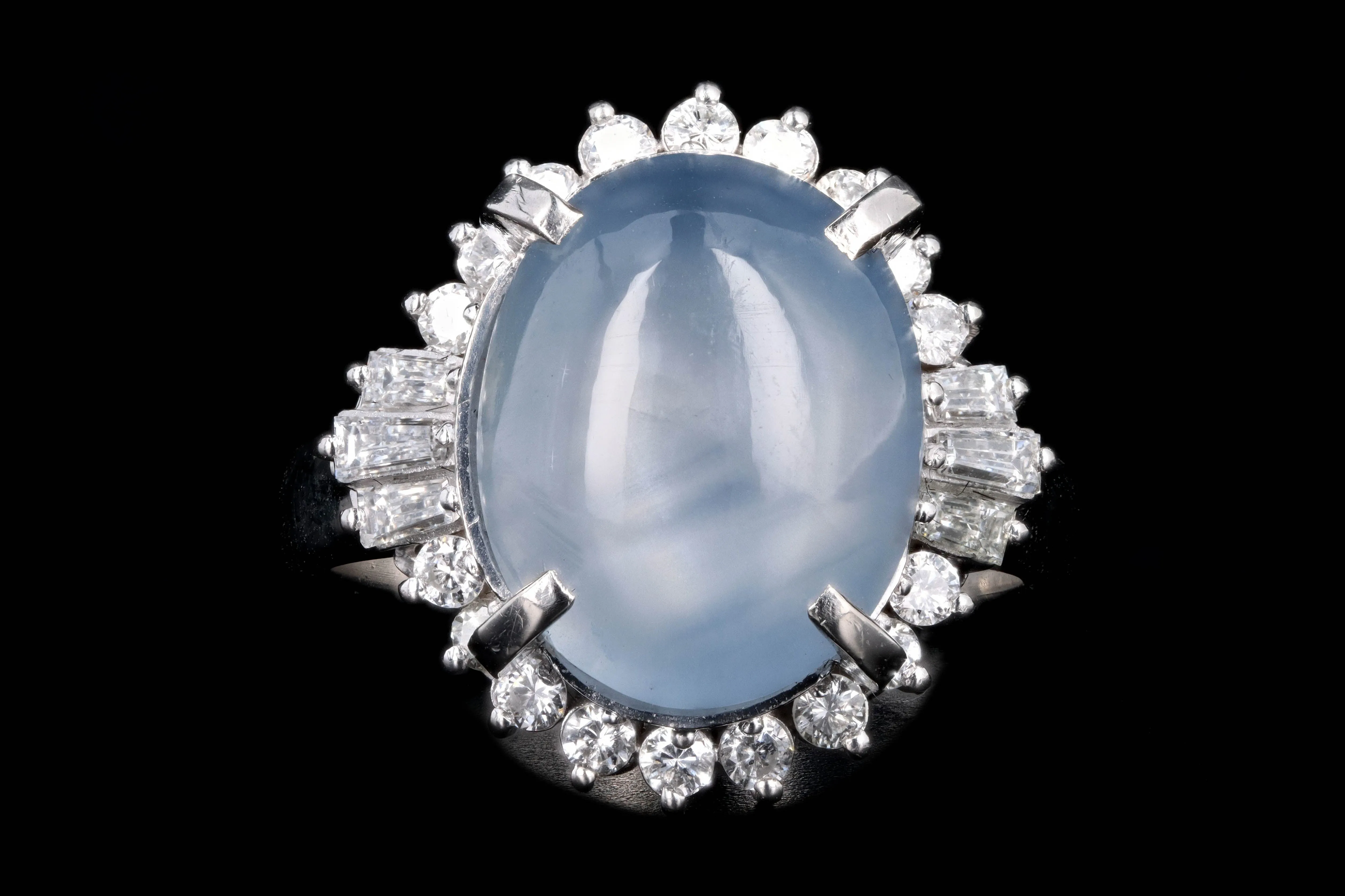 Retro Platinum 12.38 Carat Star Sapphire & Diamond Ring