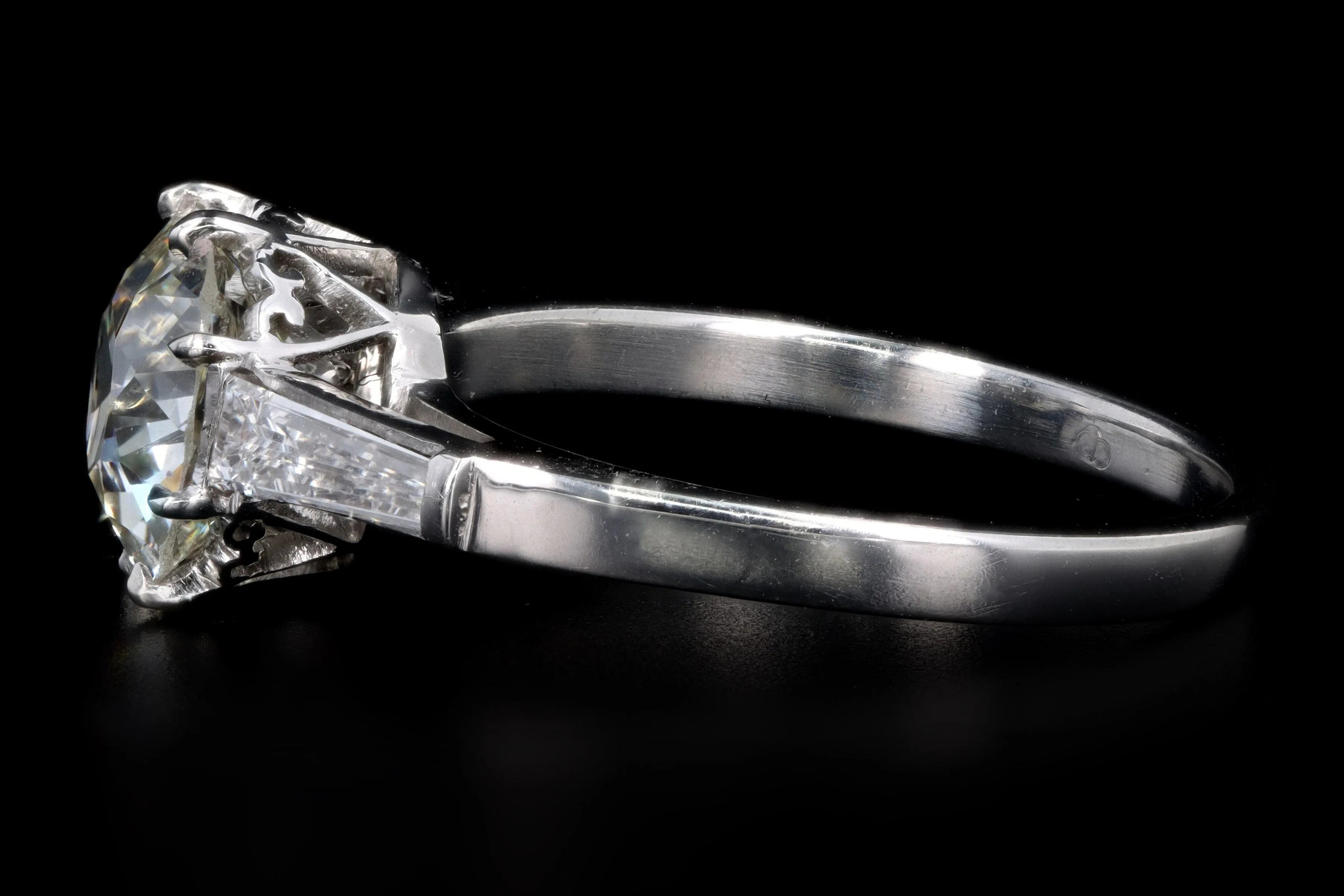 Retro Platinum 1.52 Carat Old European Cut Diamond & Tapered Baguette Diamond Engagement Ring