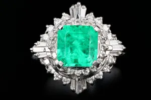 Retro Platinum 1.83 Carat Emerald and Diamond Cocktail Ring