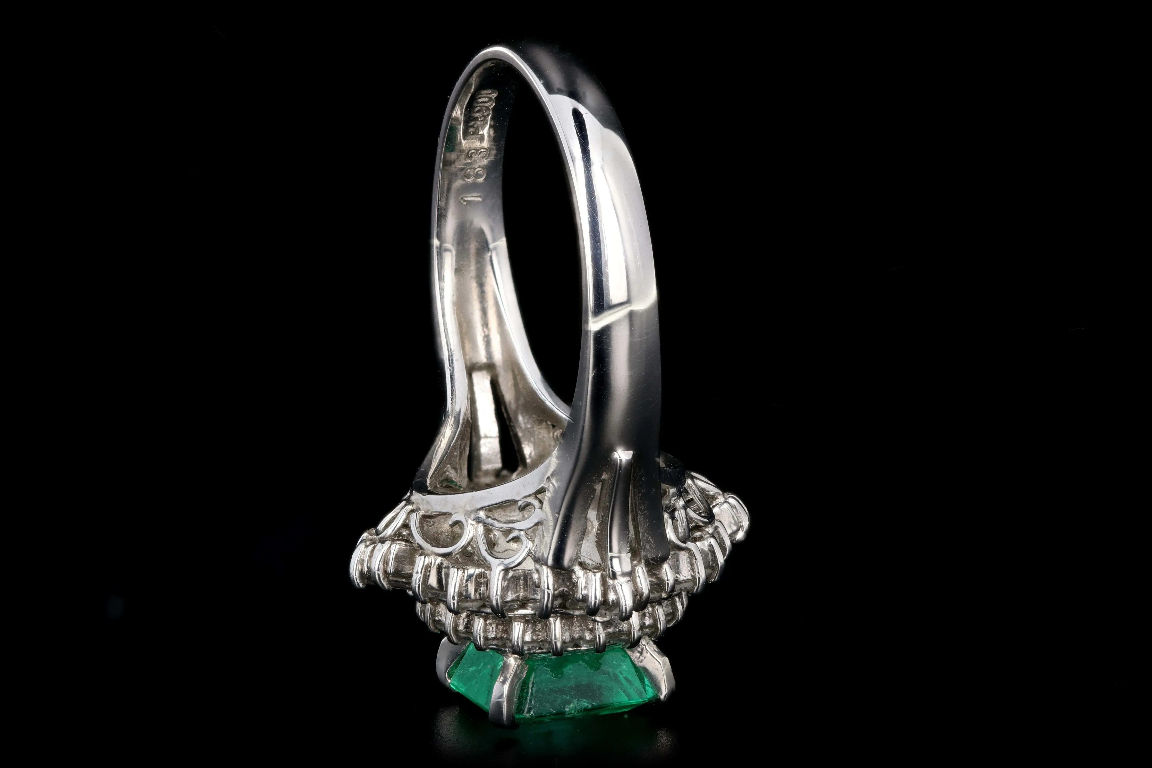 Retro Platinum 1.83 Carat Emerald and Diamond Cocktail Ring