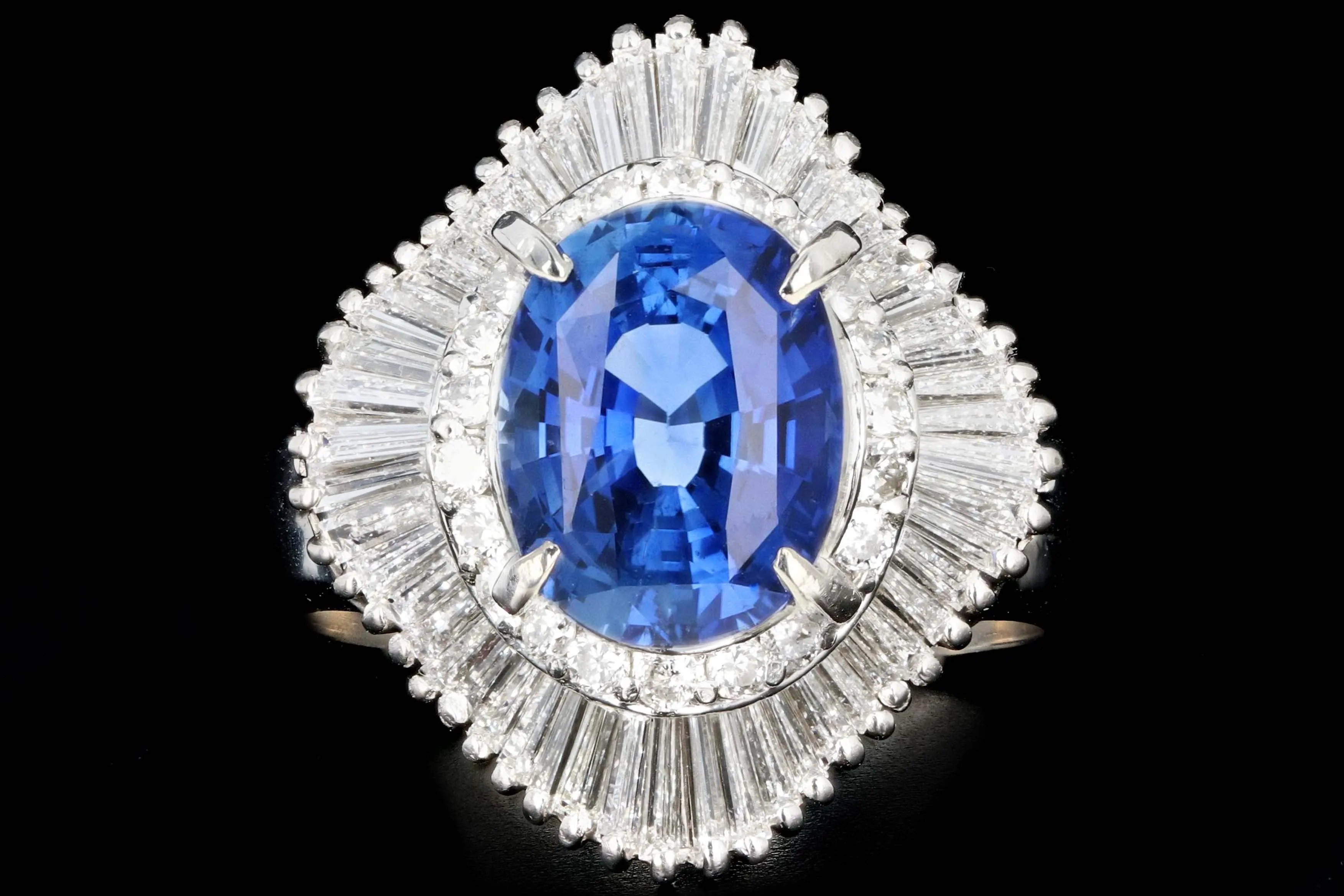 Retro Platinum 2.46 Carat Oval Sapphire and Diamond Cocktail Ring