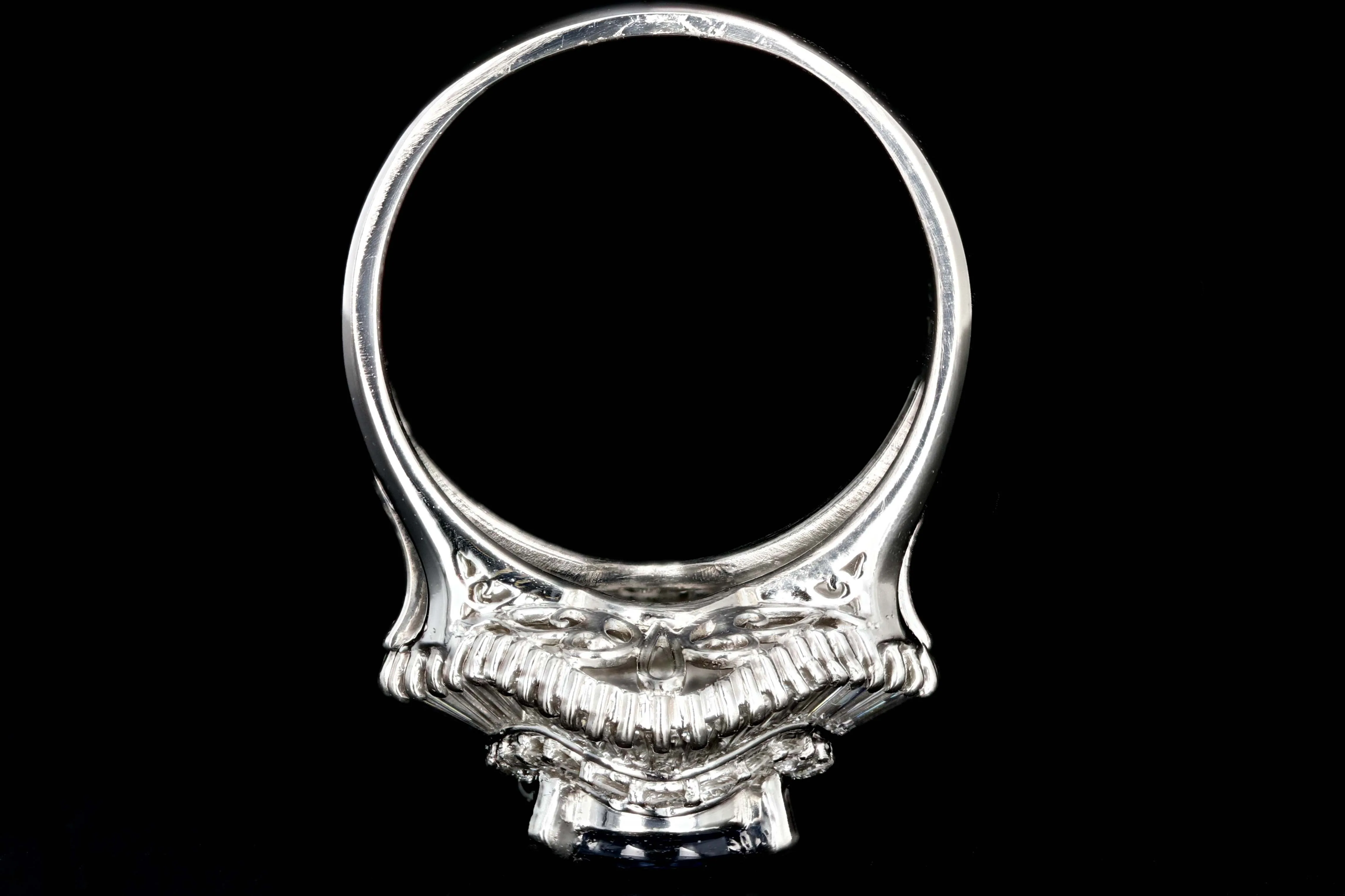 Retro Platinum 2.46 Carat Oval Sapphire and Diamond Cocktail Ring