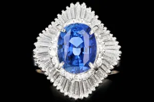 Retro Platinum 2.46 Carat Oval Sapphire and Diamond Cocktail Ring