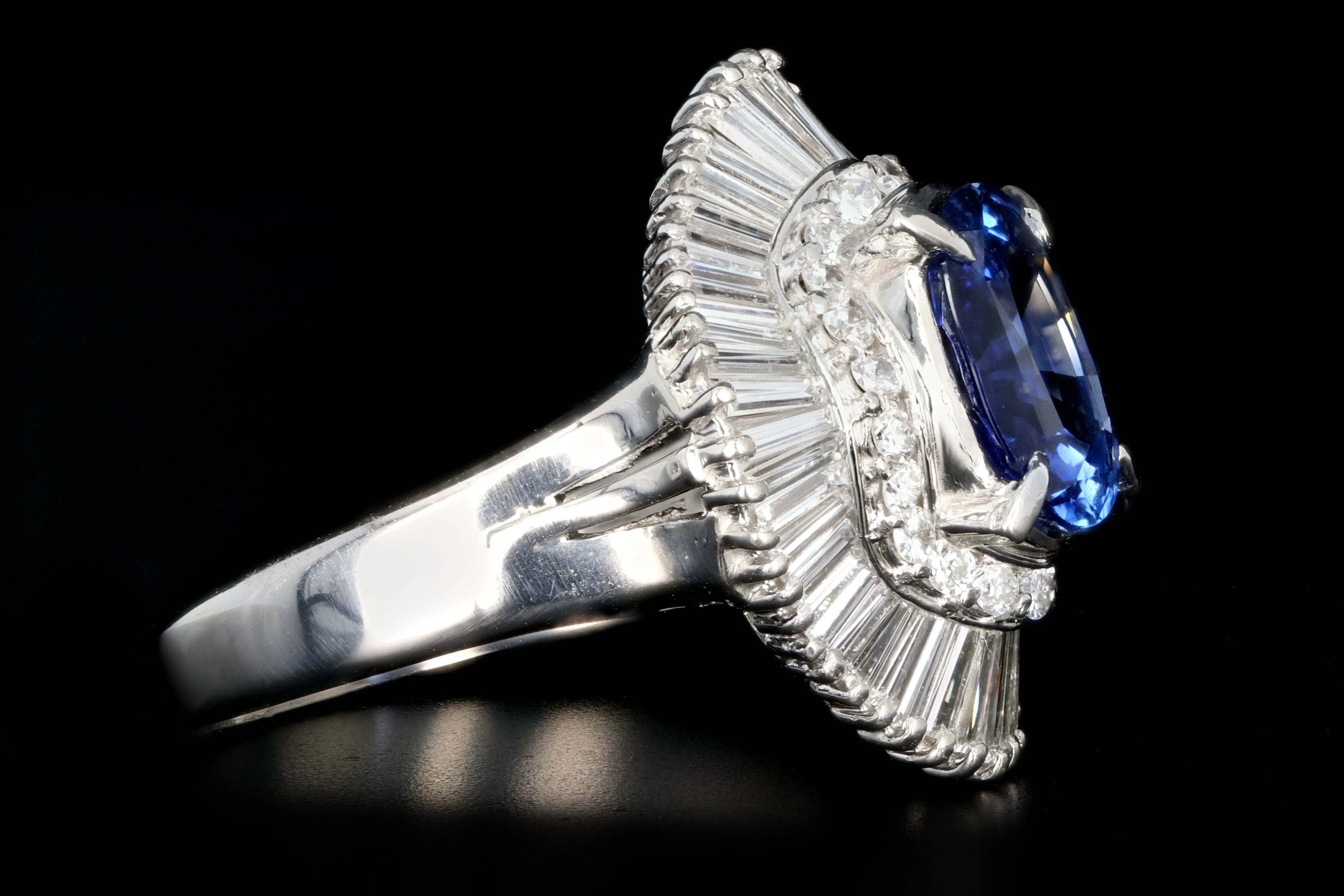 Retro Platinum 2.46 Carat Oval Sapphire and Diamond Cocktail Ring