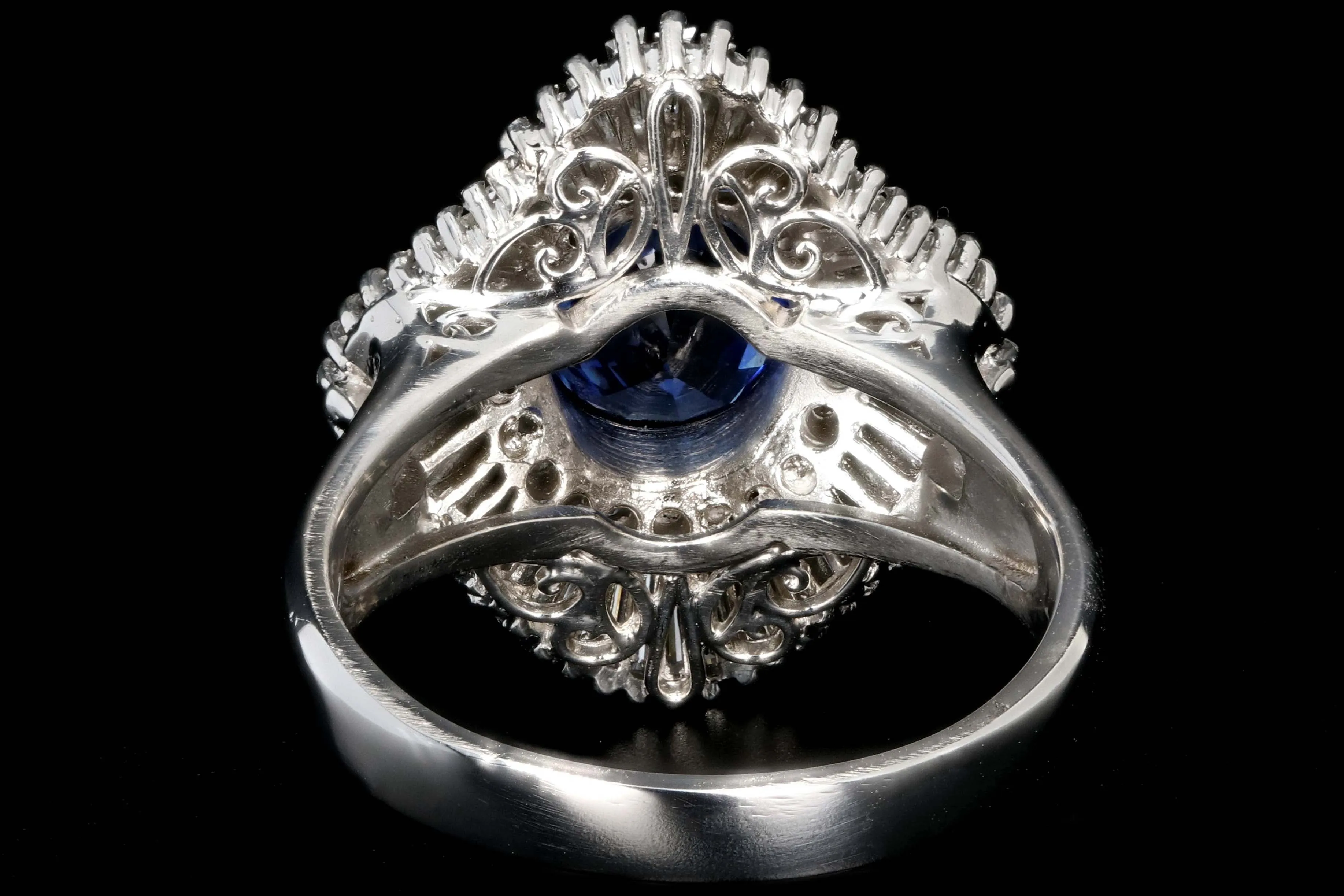 Retro Platinum 2.46 Carat Oval Sapphire and Diamond Cocktail Ring