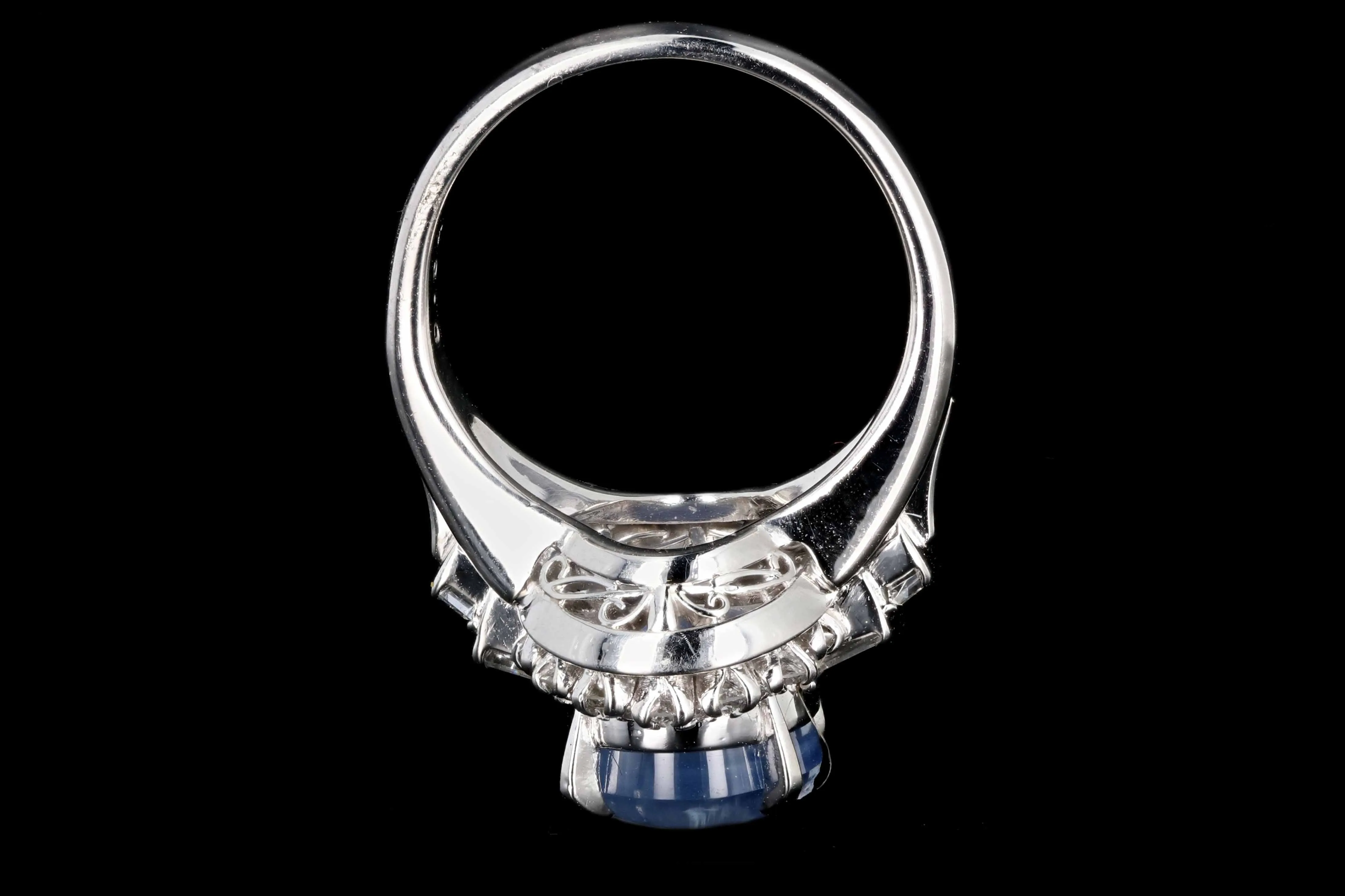 Retro Platinum 6.14 Carat Star Sapphire and Diamond Ring