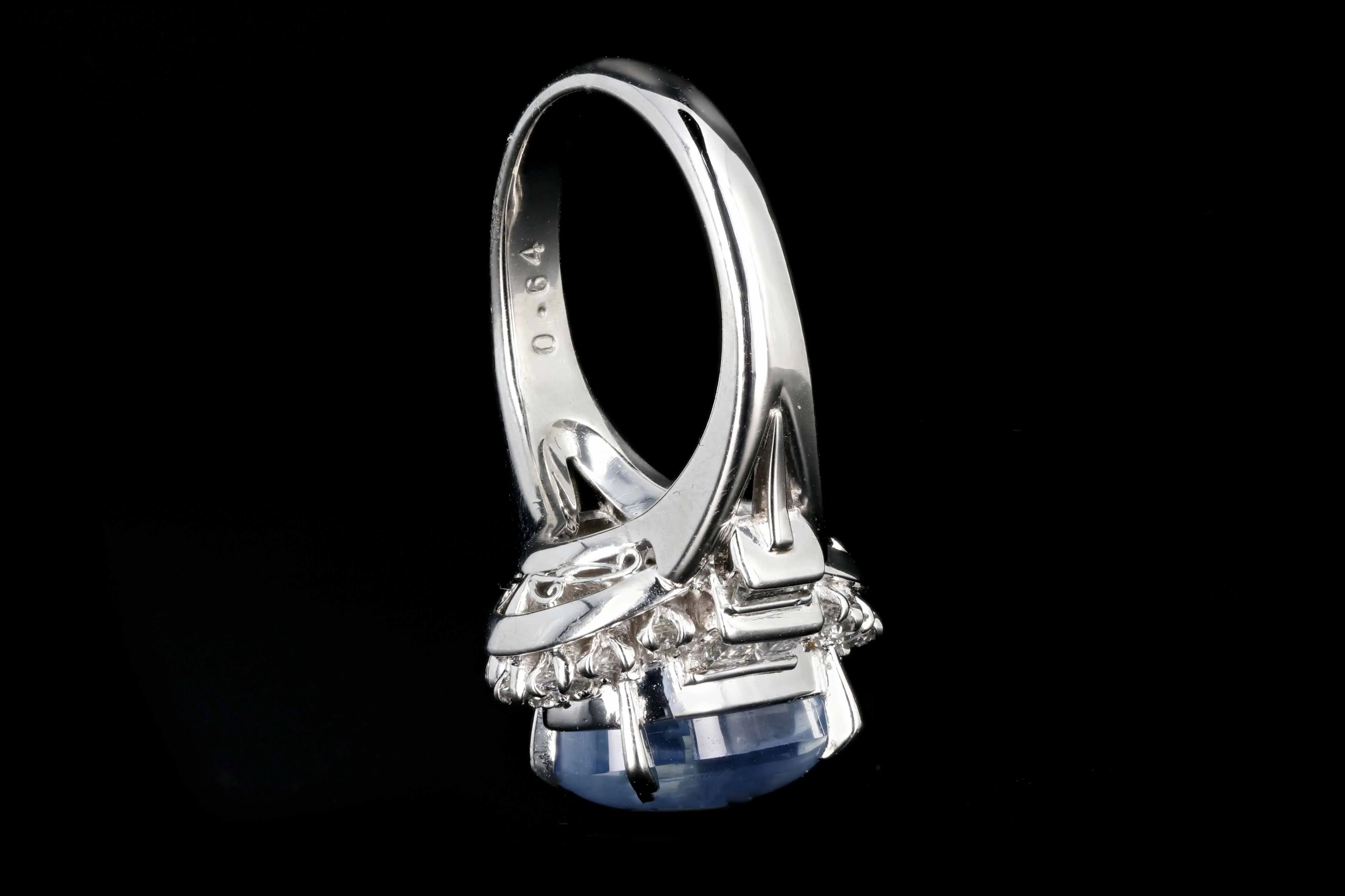 Retro Platinum 6.14 Carat Star Sapphire and Diamond Ring