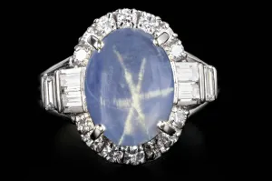 Retro Platinum 6.14 Carat Star Sapphire and Diamond Ring