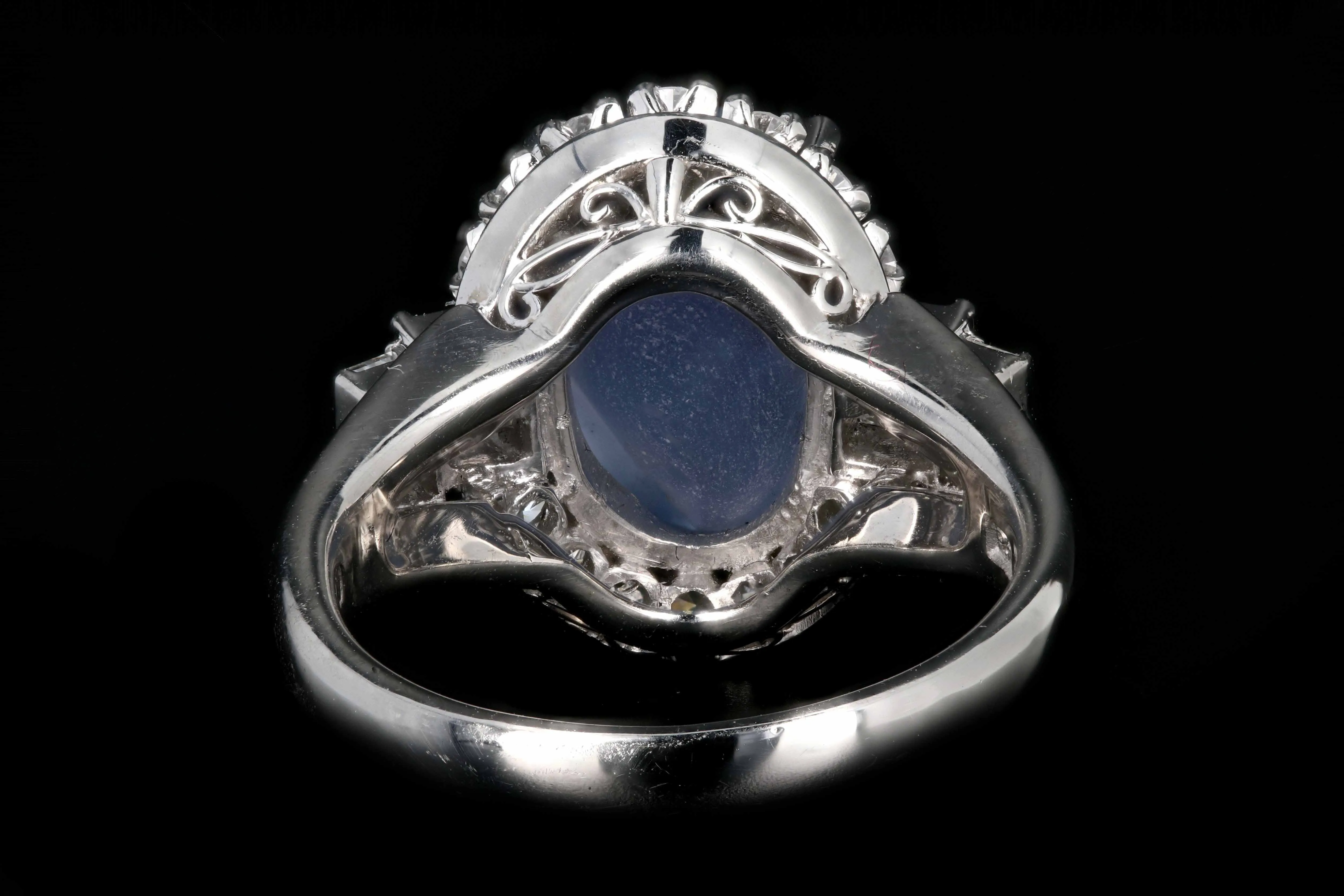 Retro Platinum 6.14 Carat Star Sapphire and Diamond Ring