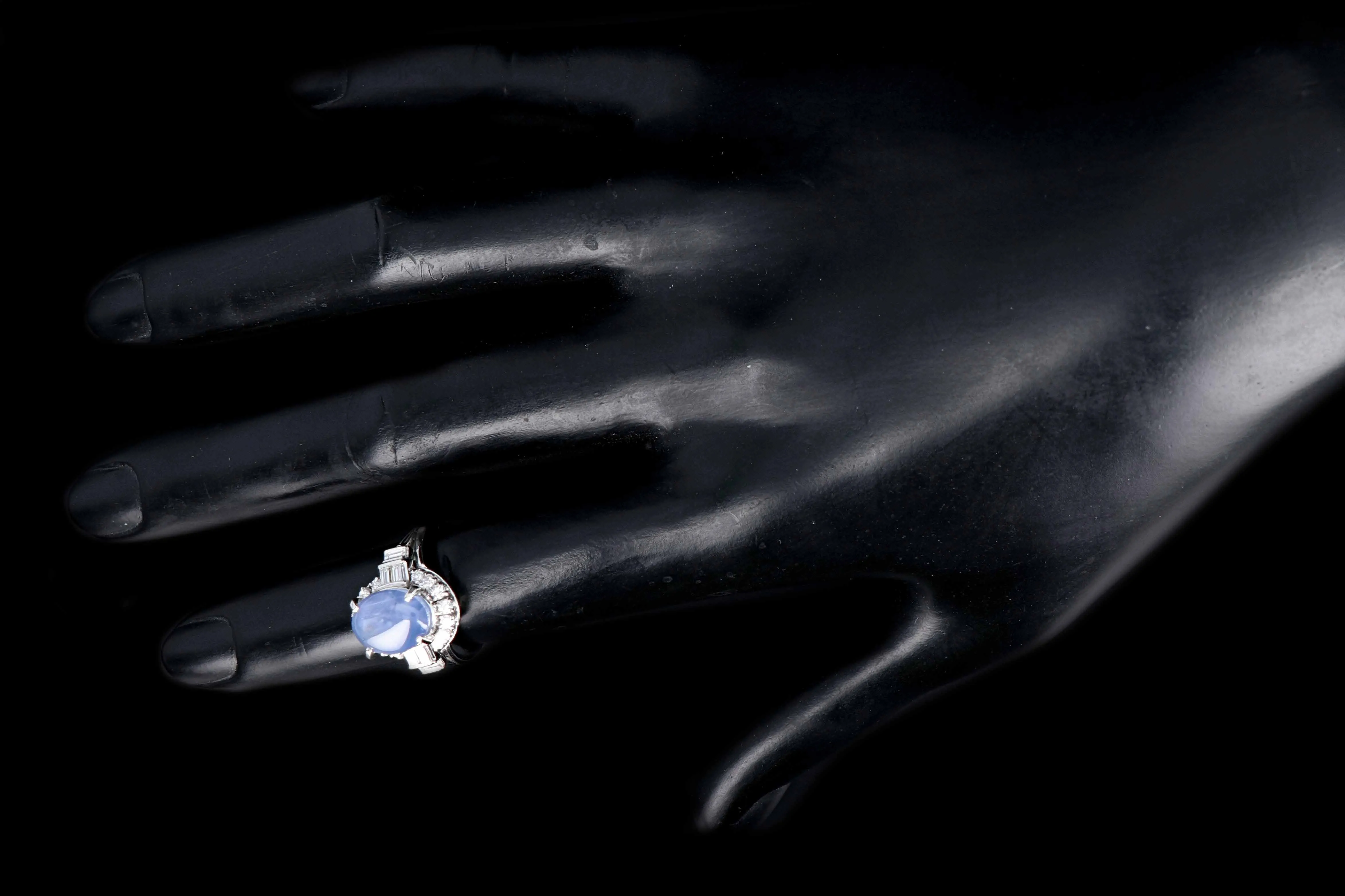 Retro Platinum 6.14 Carat Star Sapphire and Diamond Ring