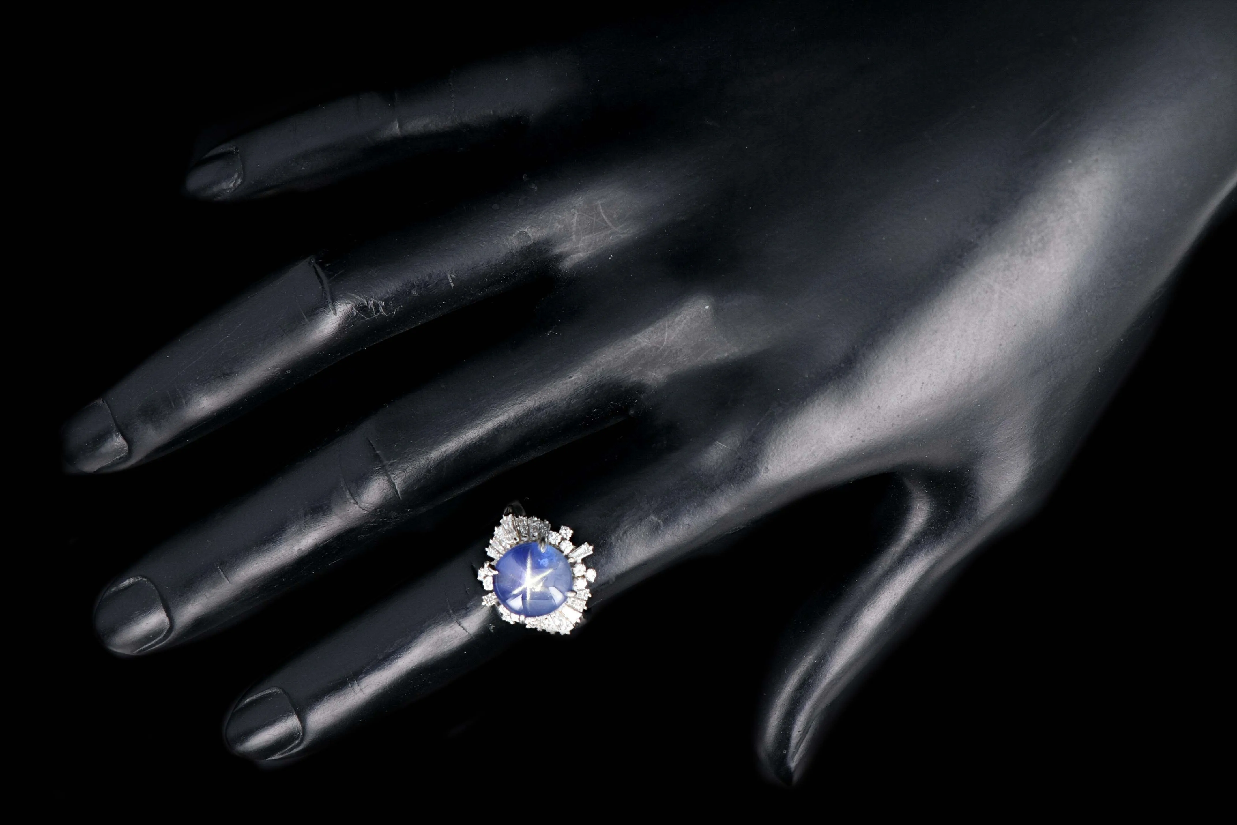 Retro Platinum 7.08 Carat Star Sapphire and Diamond Ring