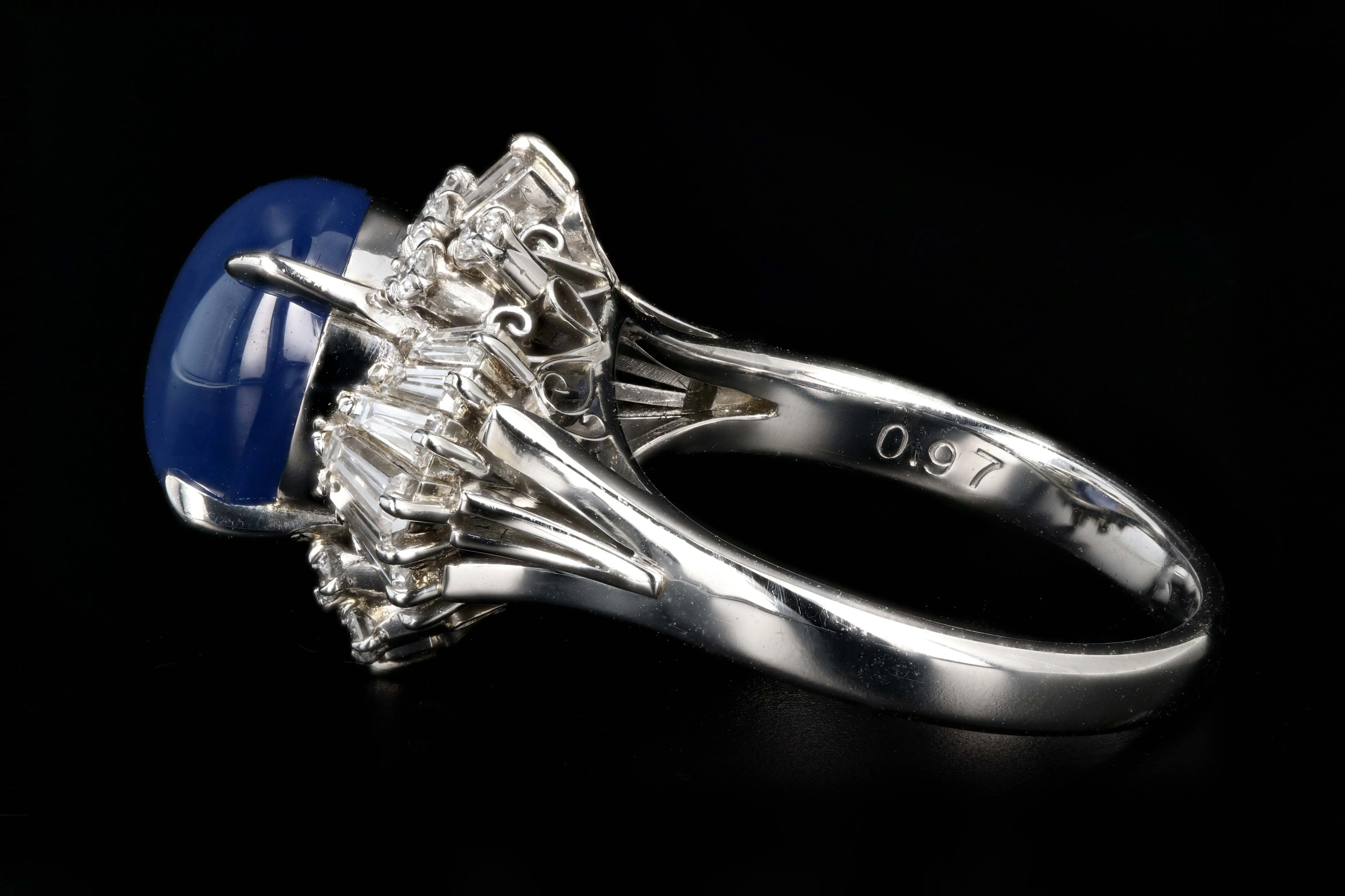 Retro Platinum 7.08 Carat Star Sapphire and Diamond Ring