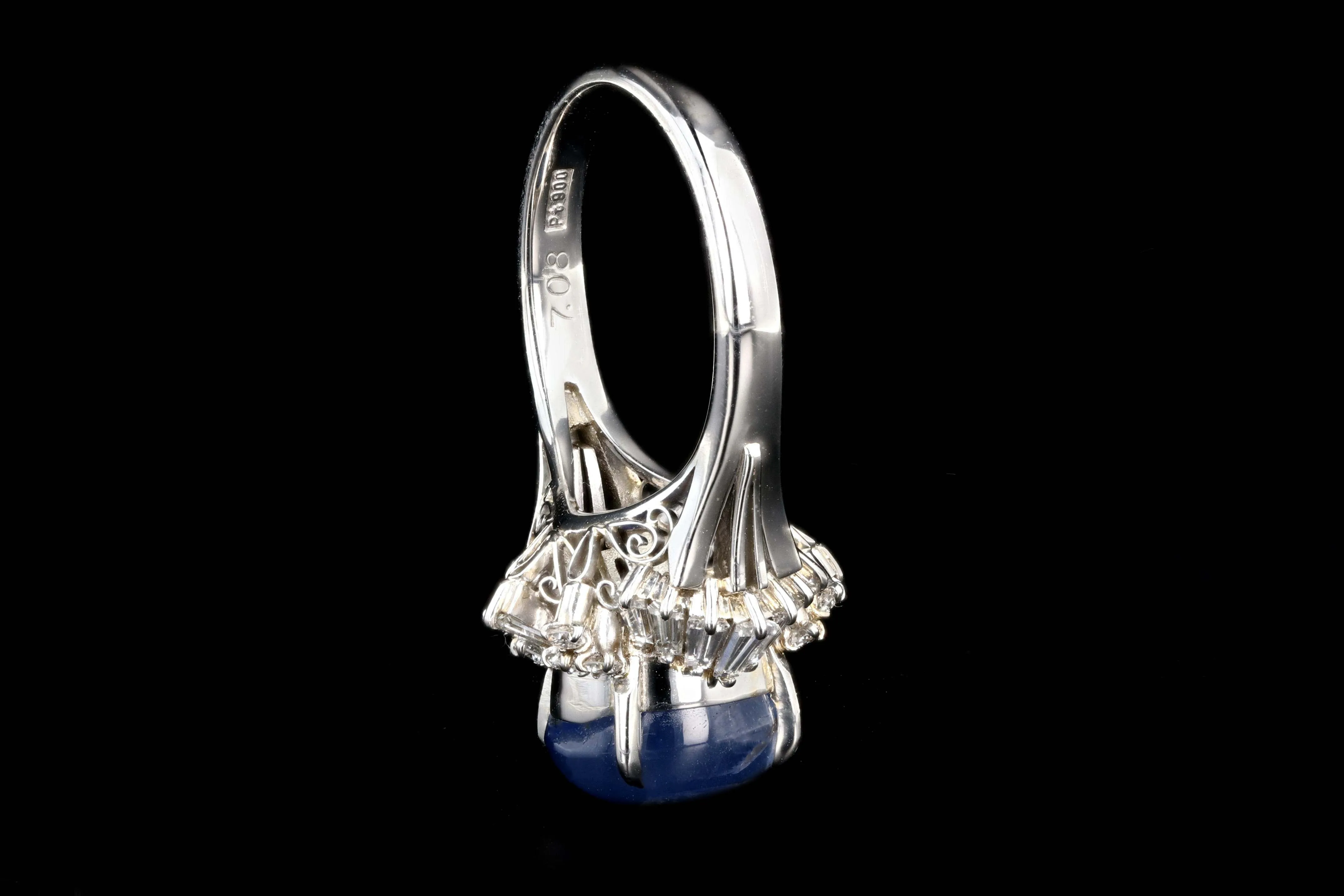 Retro Platinum 7.08 Carat Star Sapphire and Diamond Ring