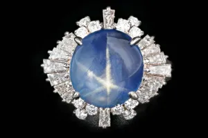 Retro Platinum 7.08 Carat Star Sapphire and Diamond Ring