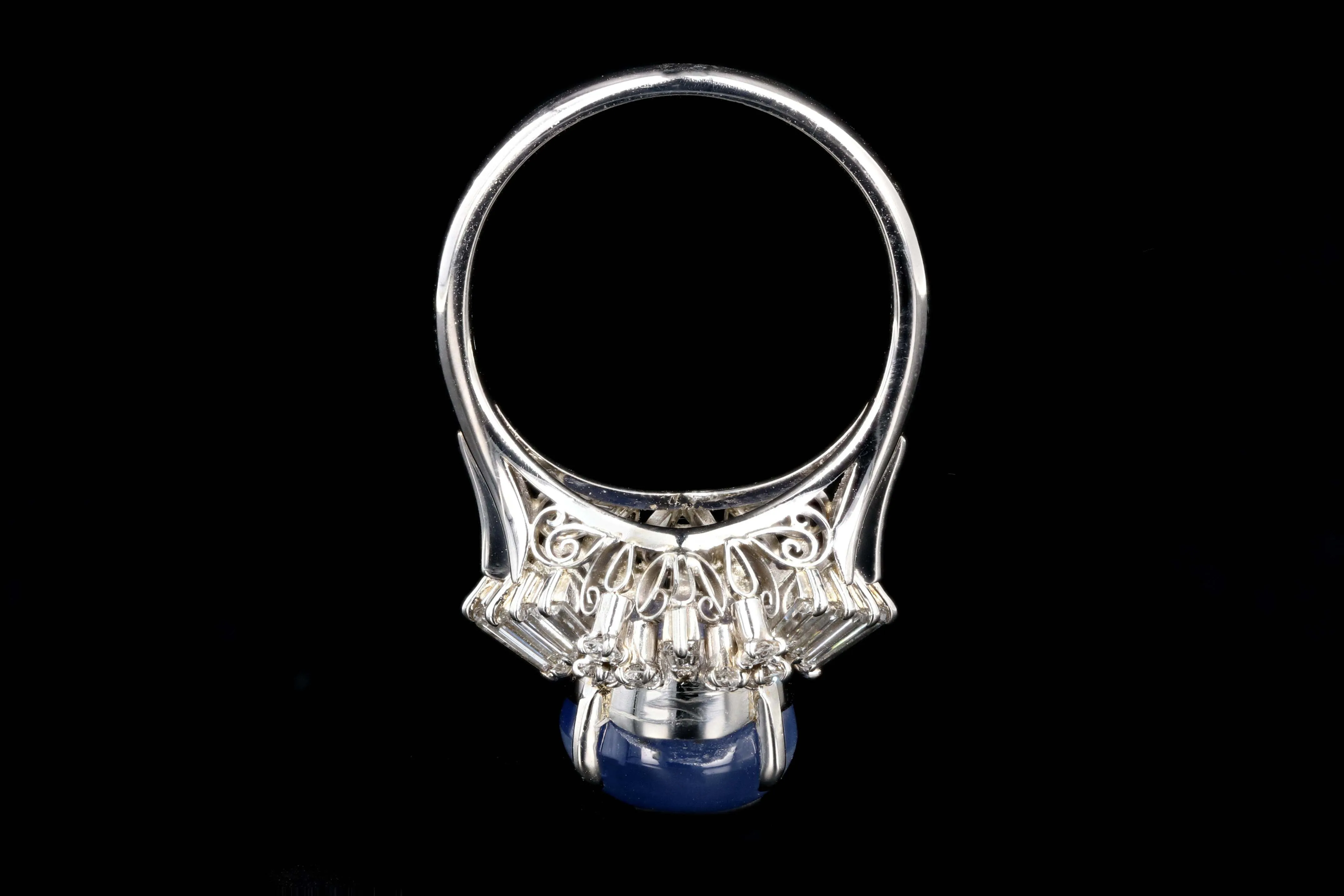 Retro Platinum 7.08 Carat Star Sapphire and Diamond Ring