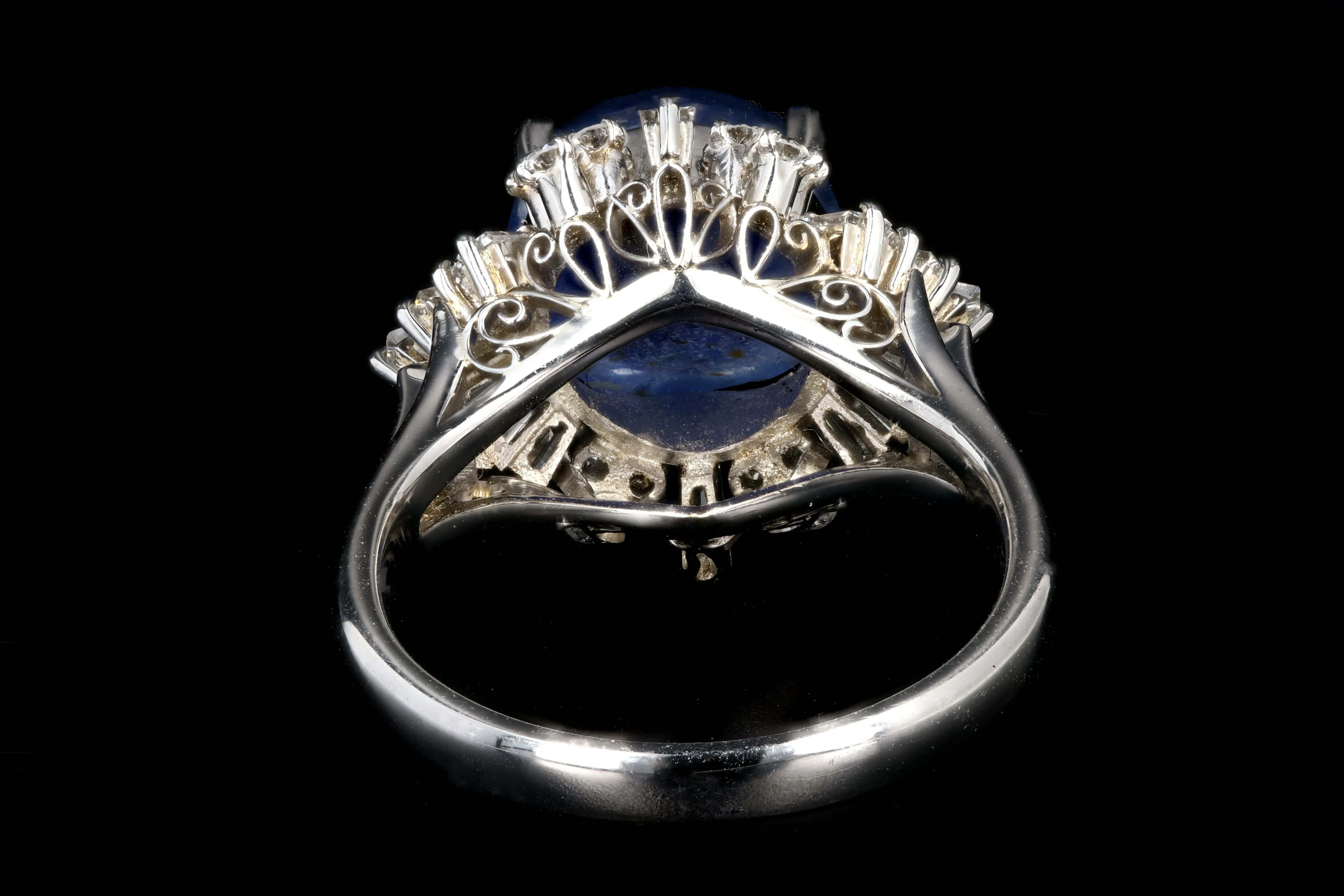 Retro Platinum 7.08 Carat Star Sapphire and Diamond Ring