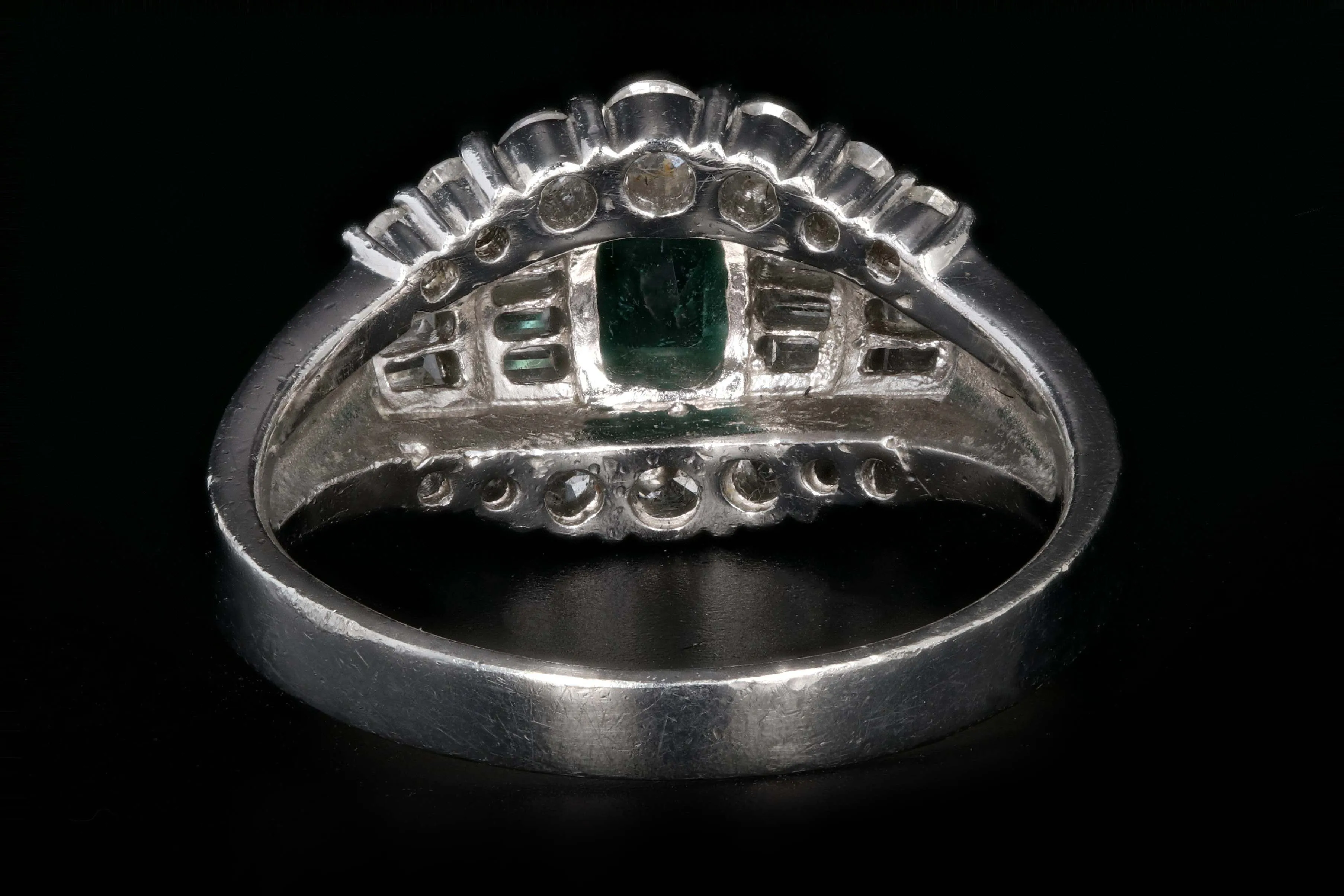 Retro Platinum .88 Carat Natural Emerald and Baguette Diamond Ring