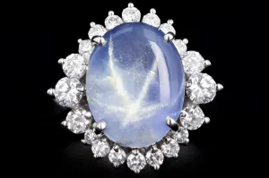 Retro Platinum 9.95 Carat Oval Cabochon Cut Natural Star Sapphire & Diamond BallerinaRing